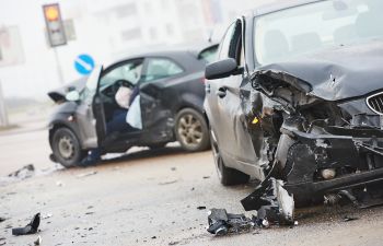 Two wrecked cars after car crash.