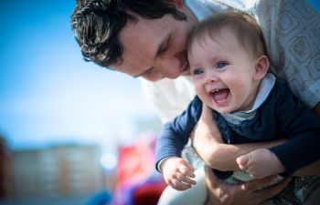 Happy father with his baby son